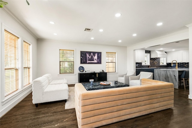 516 W 30th St, Houston, TX 77018 - living area with crown molding, dark wood finished floors, plenty of natural light, recessed lighting, and baseboards