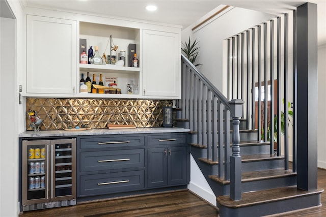 516 W 30th St, Houston, TX 77018 - indoor wet bar featuring wine cooler, dark wood finished floors, backsplash, stairway, and recessed lighting