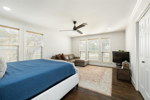 516 W 30th St, Houston, TX 77018 - bedroom featuring ornamental molding, dark wood-style flooring, a closet, recessed lighting, and baseboards