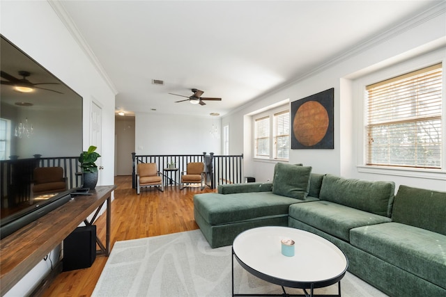516 W 30th St, Houston, TX 77018 - living area featuring ceiling fan, light wood finished floors, and crown molding