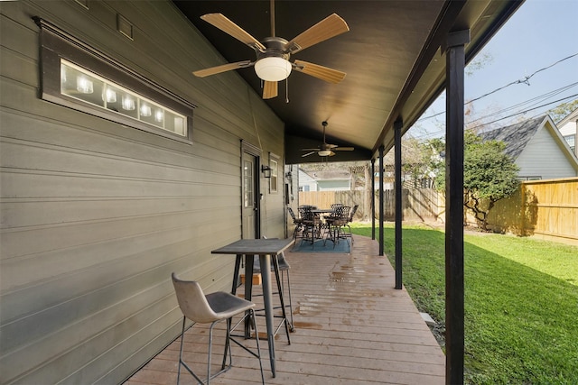 516 W 30th St, Houston, TX 77018 - wooden terrace with outdoor dining area and ceiling fan