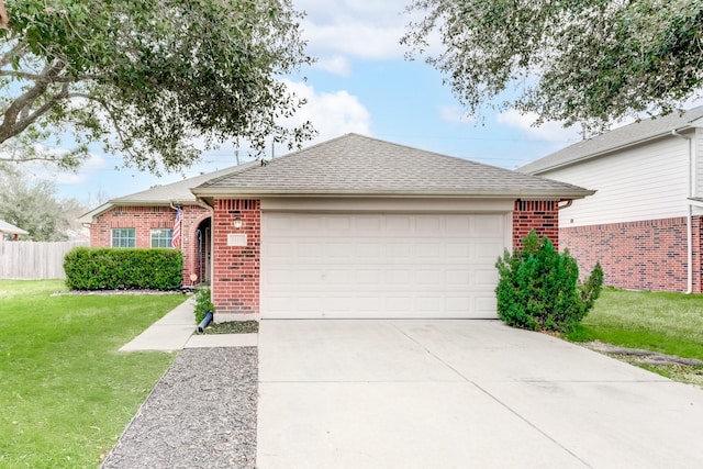 single story home featuring brick siding, a shingled roof, concrete driveway, an attached garage, and fence