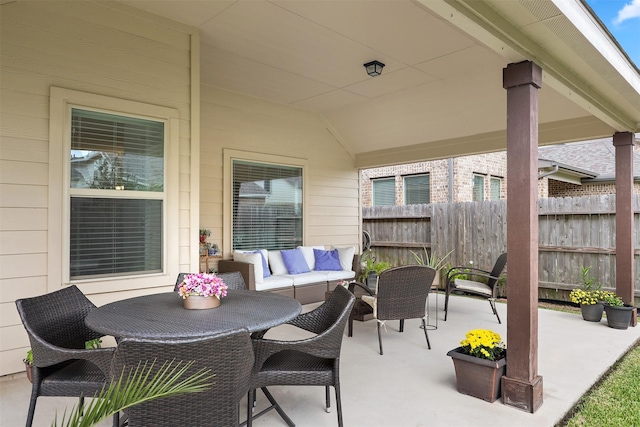 view of patio / terrace with fence and an outdoor hangout area