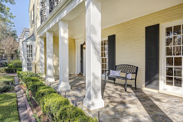 view of patio featuring a porch