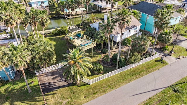 bird's eye view with a water view and a residential view