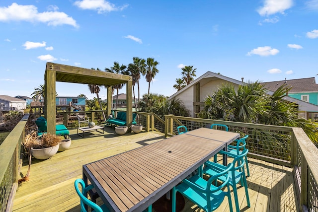 wooden deck with outdoor dining space