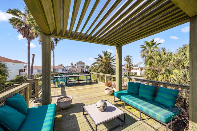 wooden deck with an outdoor living space