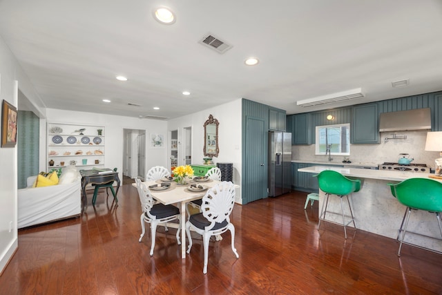 dining room with visible vents, dark wood finished floors, and recessed lighting