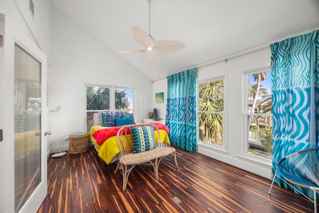 bedroom with high vaulted ceiling, ceiling fan, visible vents, and wood finished floors