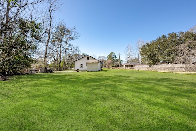 view of yard featuring fence