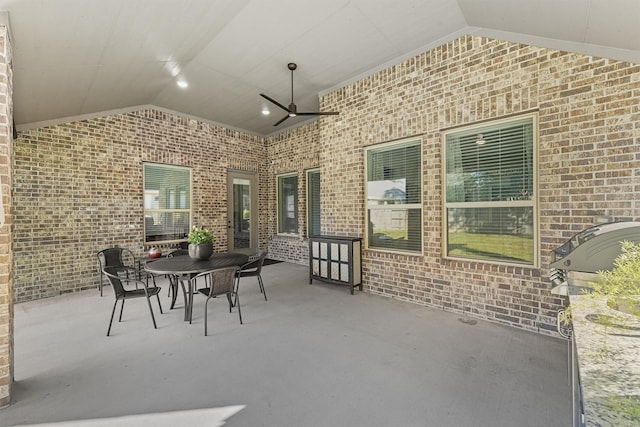 view of patio featuring a ceiling fan and outdoor dining area