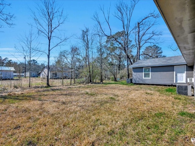 view of yard featuring central AC