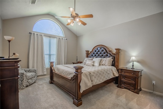 bedroom with visible vents, lofted ceiling, light colored carpet, and a ceiling fan