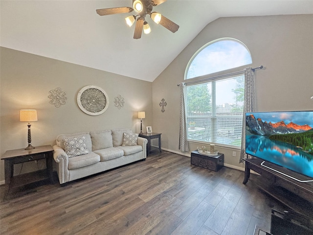 living area featuring baseboards, ceiling fan, wood finished floors, and lofted ceiling