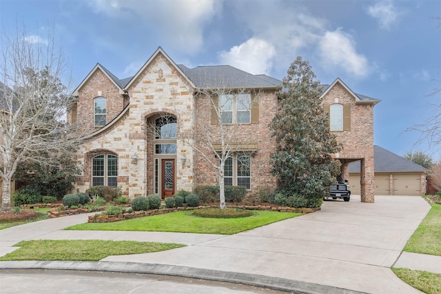 view of front of property with brick siding and a front lawn