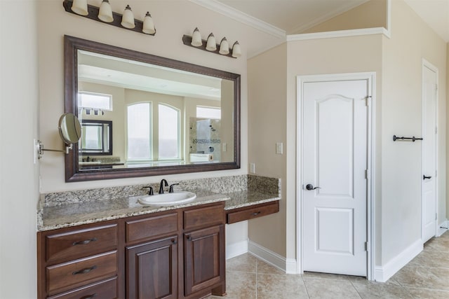 bathroom featuring tile patterned floors, baseboards, ornamental molding, and vanity