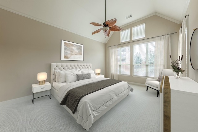 bedroom featuring light colored carpet, visible vents, a ceiling fan, vaulted ceiling, and baseboards