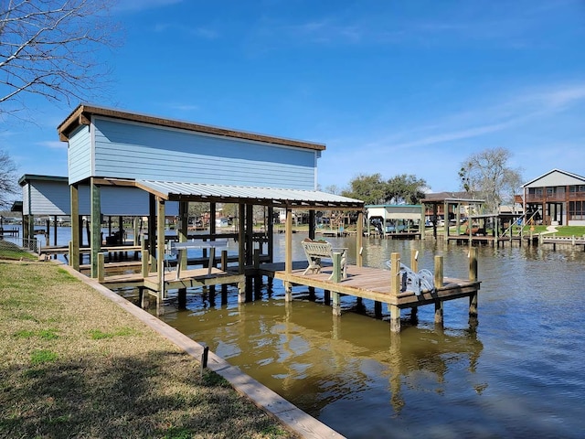 dock area featuring a water view and boat lift