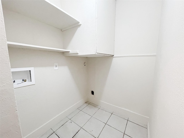 washroom featuring hookup for a washing machine, laundry area, hookup for an electric dryer, and light tile patterned floors