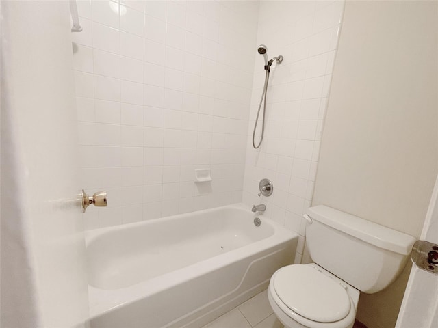 full bathroom featuring tile patterned flooring, shower / bath combination, and toilet