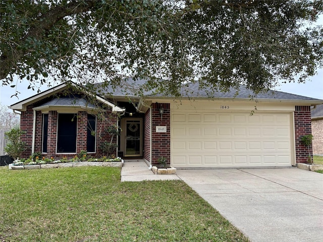 ranch-style house featuring a front yard, concrete driveway, brick siding, and an attached garage