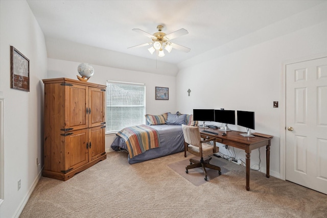 bedroom with light carpet, ceiling fan, and baseboards