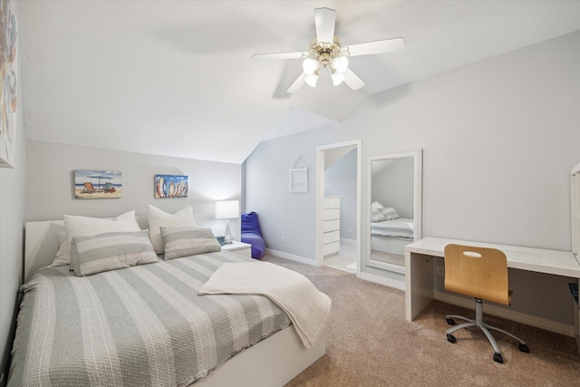 bedroom with lofted ceiling, light carpet, ceiling fan, and baseboards