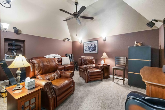 carpeted cinema room featuring ceiling fan and lofted ceiling