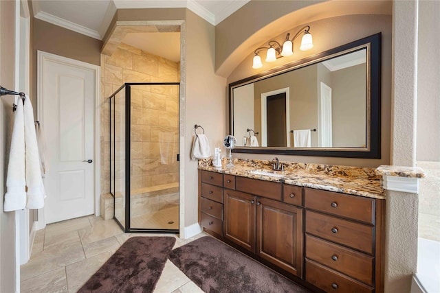 full bath with a shower stall, crown molding, and vanity