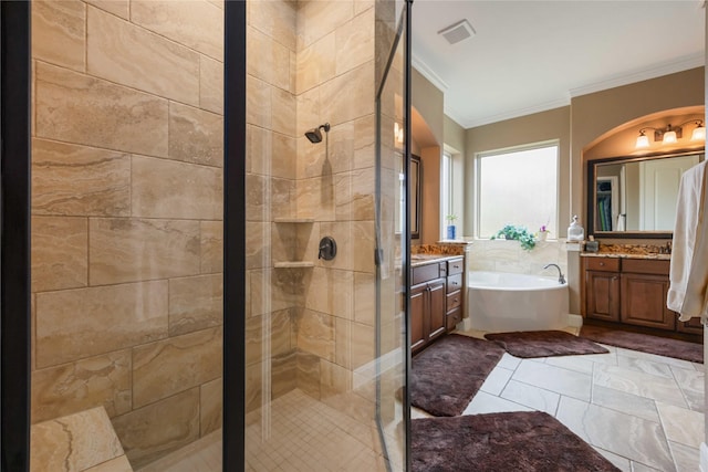 bathroom featuring a garden tub, visible vents, ornamental molding, and a stall shower