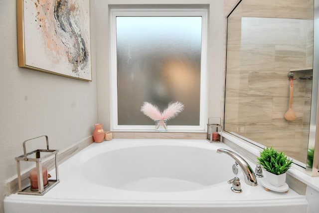 bathroom featuring a garden tub