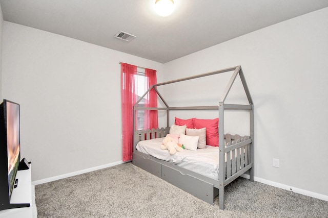 bedroom with carpet flooring, visible vents, and baseboards