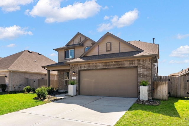 view of front of home featuring concrete driveway, an attached garage, fence, a front lawn, and brick siding