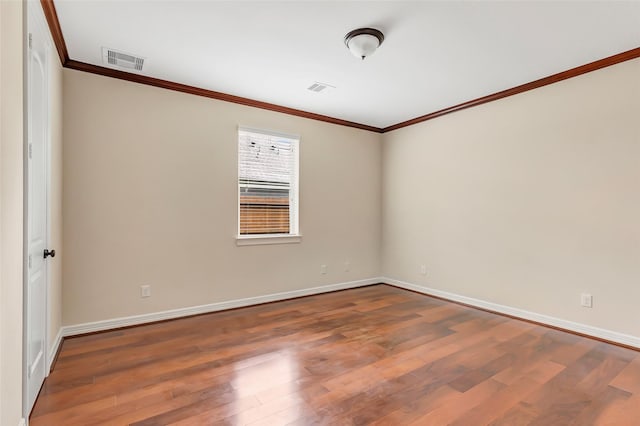 13006 Freemont Peak Ln, Humble, TX 77346 - unfurnished room with ornamental molding, baseboards, and wood finished floors