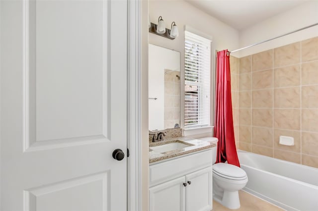 13006 Freemont Peak Ln, Humble, TX 77346 - bathroom featuring vanity, toilet, shower / tub combo with curtain, and healthy amount of natural light