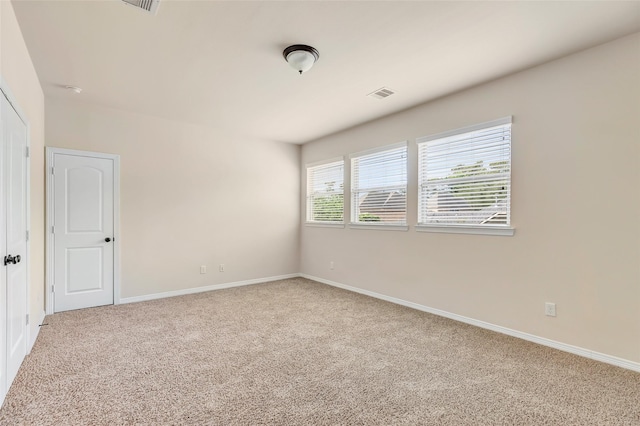 13006 Freemont Peak Ln, Humble, TX 77346 - spare room with carpet and baseboards