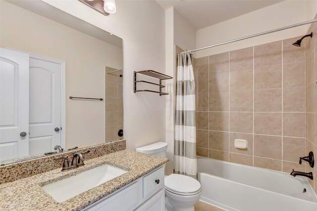 13006 Freemont Peak Ln, Humble, TX 77346 - bathroom with vanity, shower / bath combo, and toilet