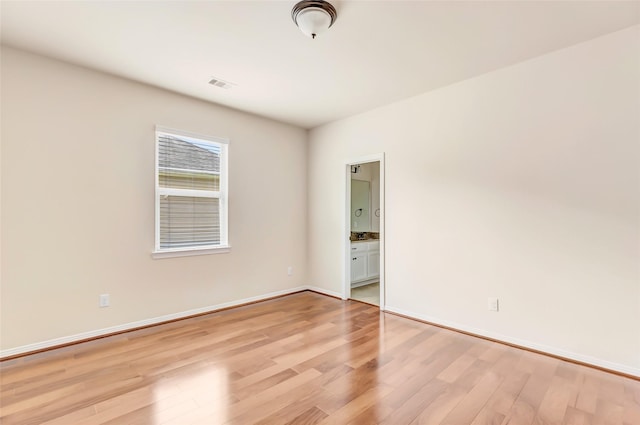 13006 Freemont Peak Ln, Humble, TX 77346 - spare room with light wood finished floors and baseboards