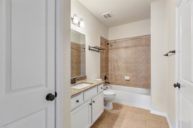 13006 Freemont Peak Ln, Humble, TX 77346 - full bath featuring vanity, toilet, shower / washtub combination, and tile patterned flooring