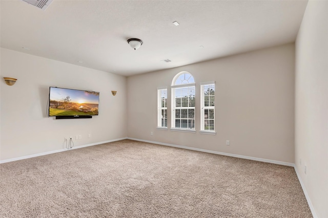 13006 Freemont Peak Ln, Humble, TX 77346 - carpeted empty room with baseboards