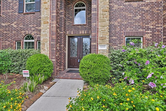 13006 Freemont Peak Ln, Humble, TX 77346 - view of exterior entry featuring brick siding