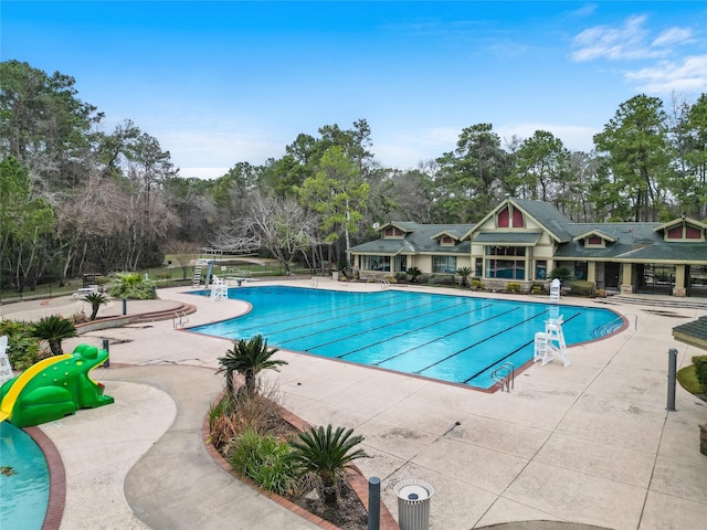 13006 Freemont Peak Ln, Humble, TX 77346 - community pool featuring view of scattered trees and a patio area