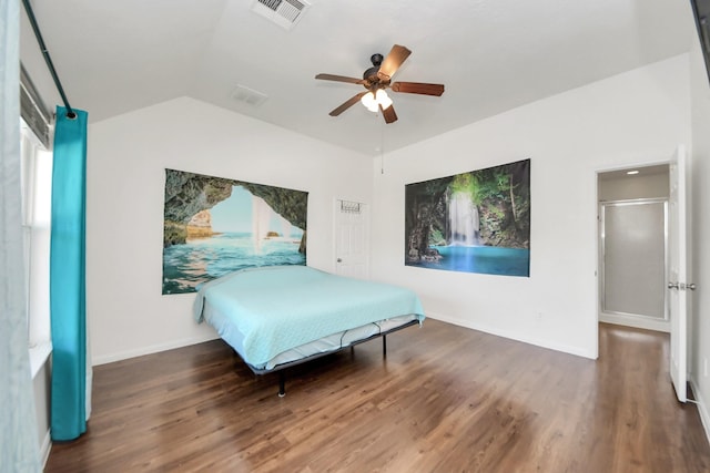 bedroom with dark wood-style flooring, lofted ceiling, visible vents, ceiling fan, and baseboards