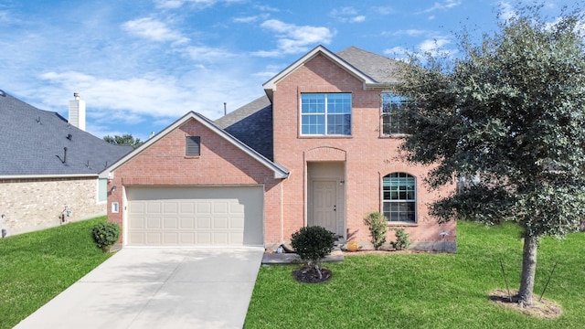 view of front of home featuring driveway, brick siding, an attached garage, and a front yard