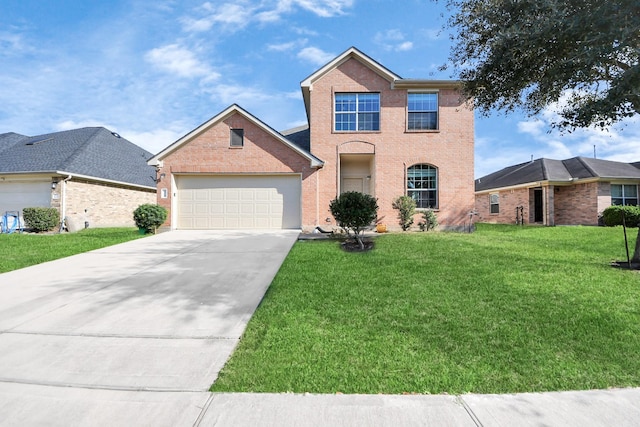 traditional-style house with a garage, driveway, a front lawn, and brick siding