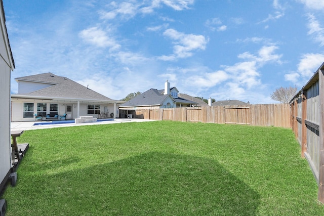 view of yard featuring a fenced backyard and a patio