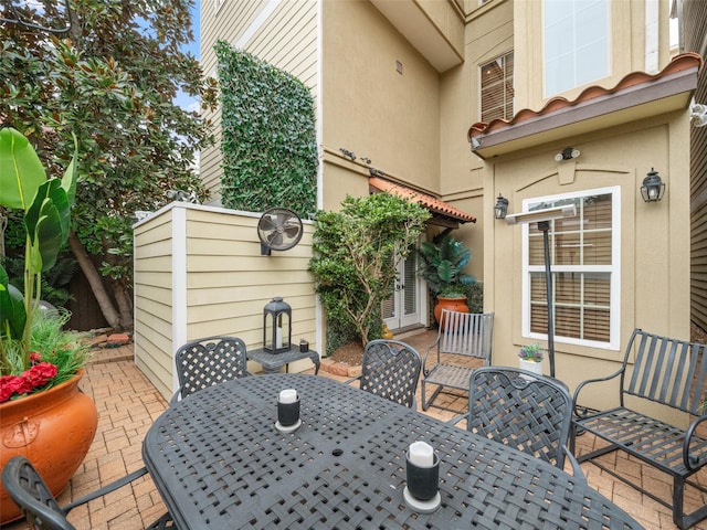 view of patio / terrace with outdoor dining area and french doors