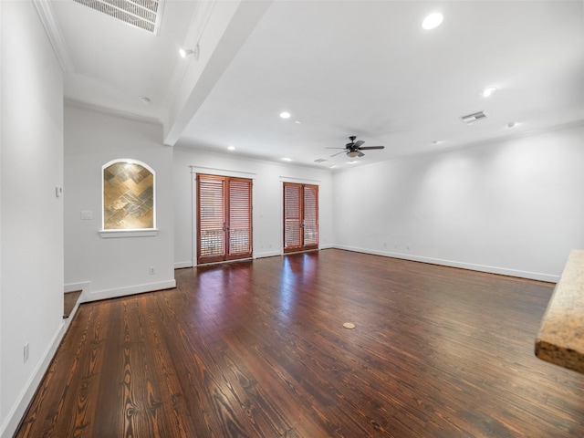 spare room featuring dark wood-style floors, visible vents, a ceiling fan, and recessed lighting