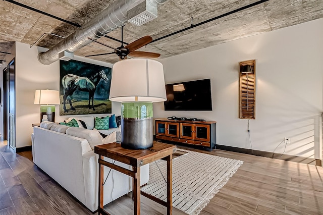 505 Bastrop St Unit 508, Houston, TX 77003 - living room with wood finished floors, ceiling fan, and baseboards