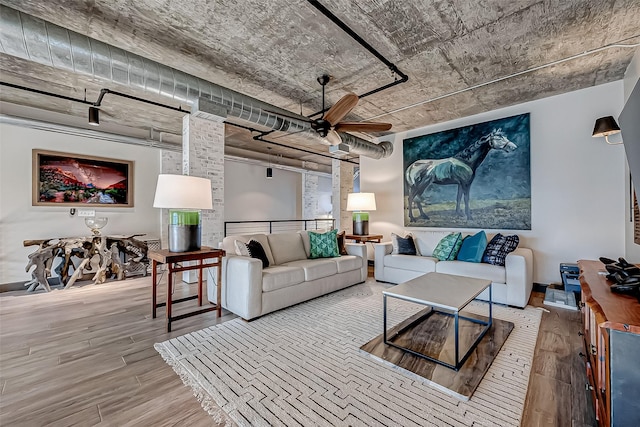 505 Bastrop St Unit 508, Houston, TX 77003 - living area featuring ceiling fan and wood finished floors
